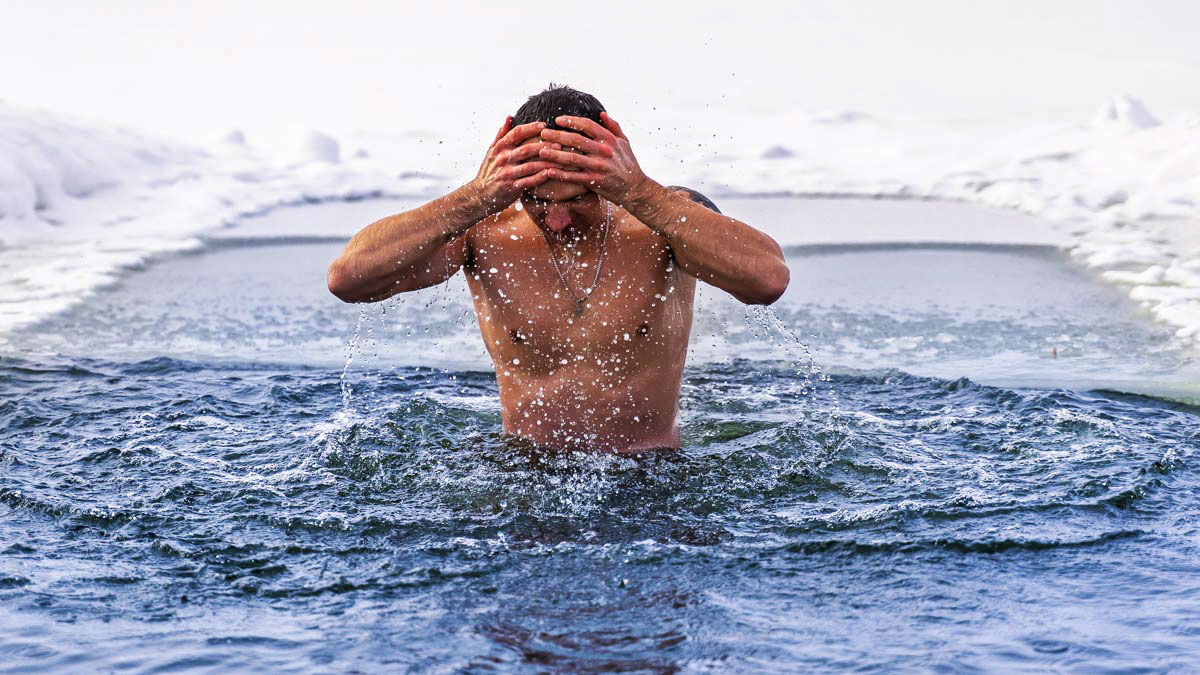Contrast Therapy For Athletes Image Of A Fit Man In A Cold Pool While Doing Contrast Therapy