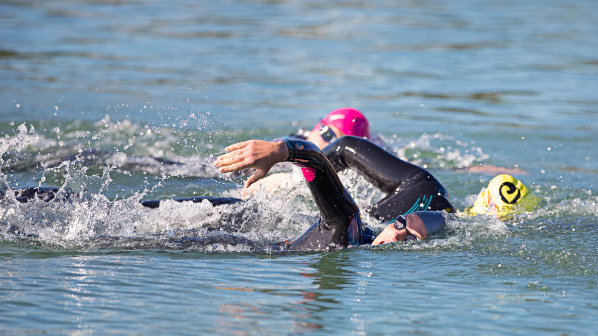 What To Expect From Your Ironman Training Plan Open Water Swimmers Swimming In An Ironman Race After Preparing With An Ironman Training Plan