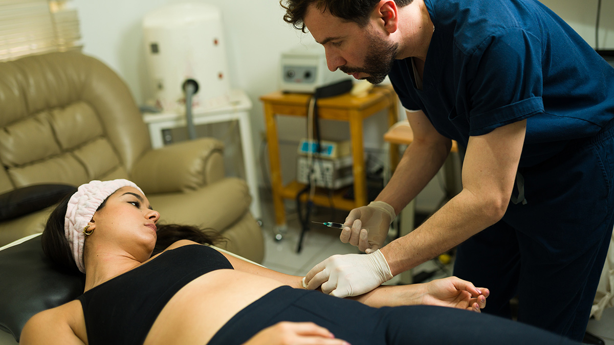Understanding Regenerative Medicine Athlete Patient Receiving Regenerative Prp Treatment From Physical Therapists